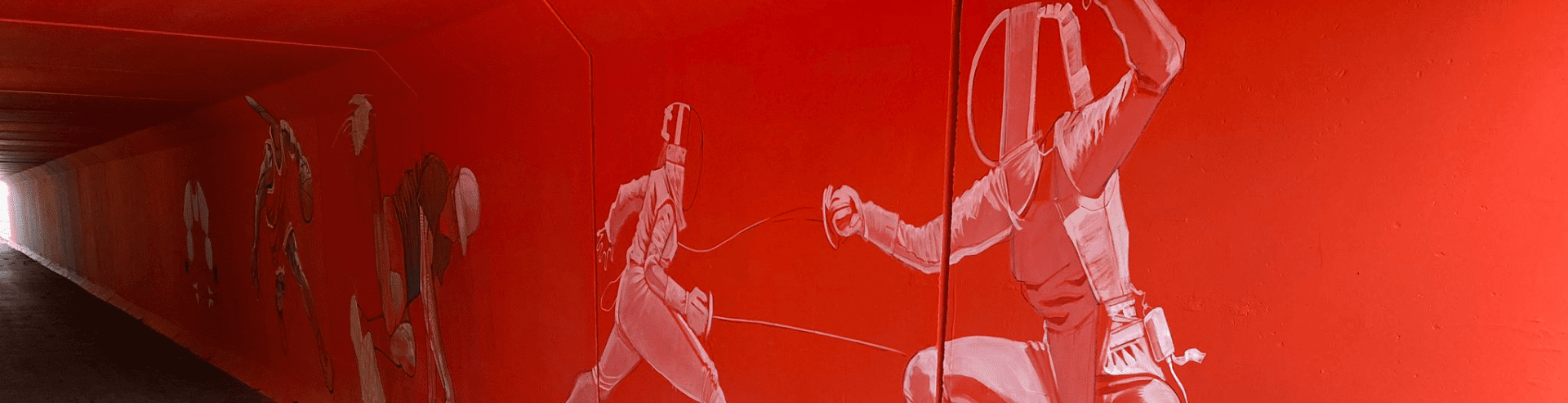 Vu du tunnel de l'Octroi avec les fresques des Jeux Olympiques